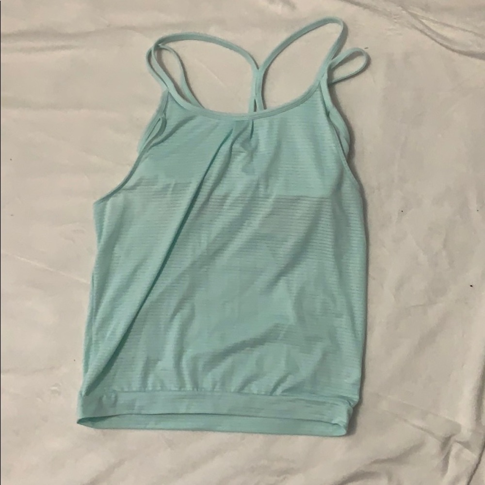 Turquoise tank top with interlaced straps